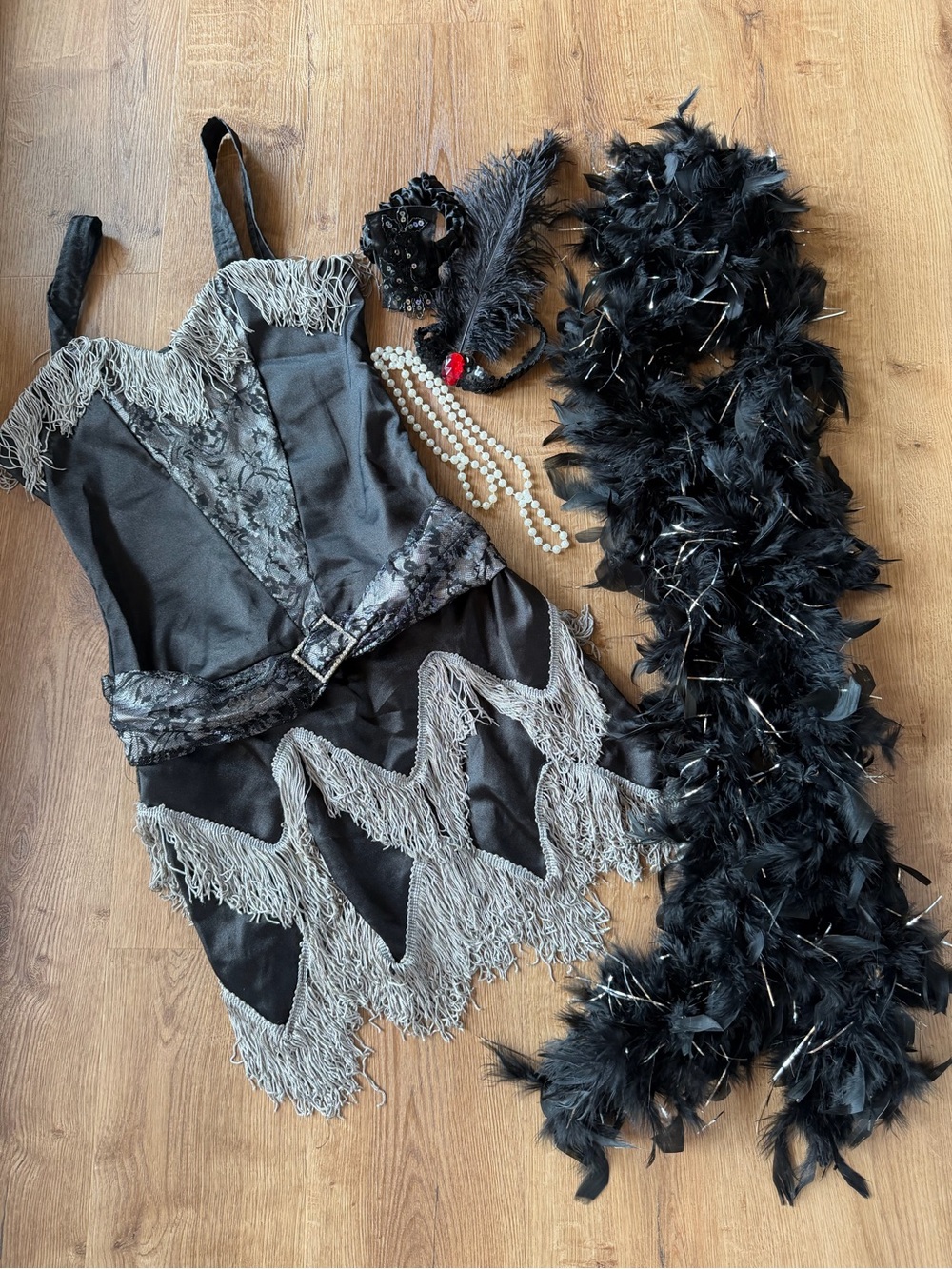 Black Flapper-Style Women’s Costume with Feather Boa and accessories